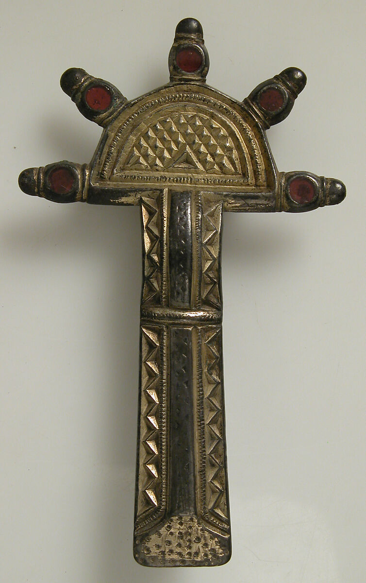Bow Brooch, Silver-gilt, niello, garnet, iron pin, Frankish 