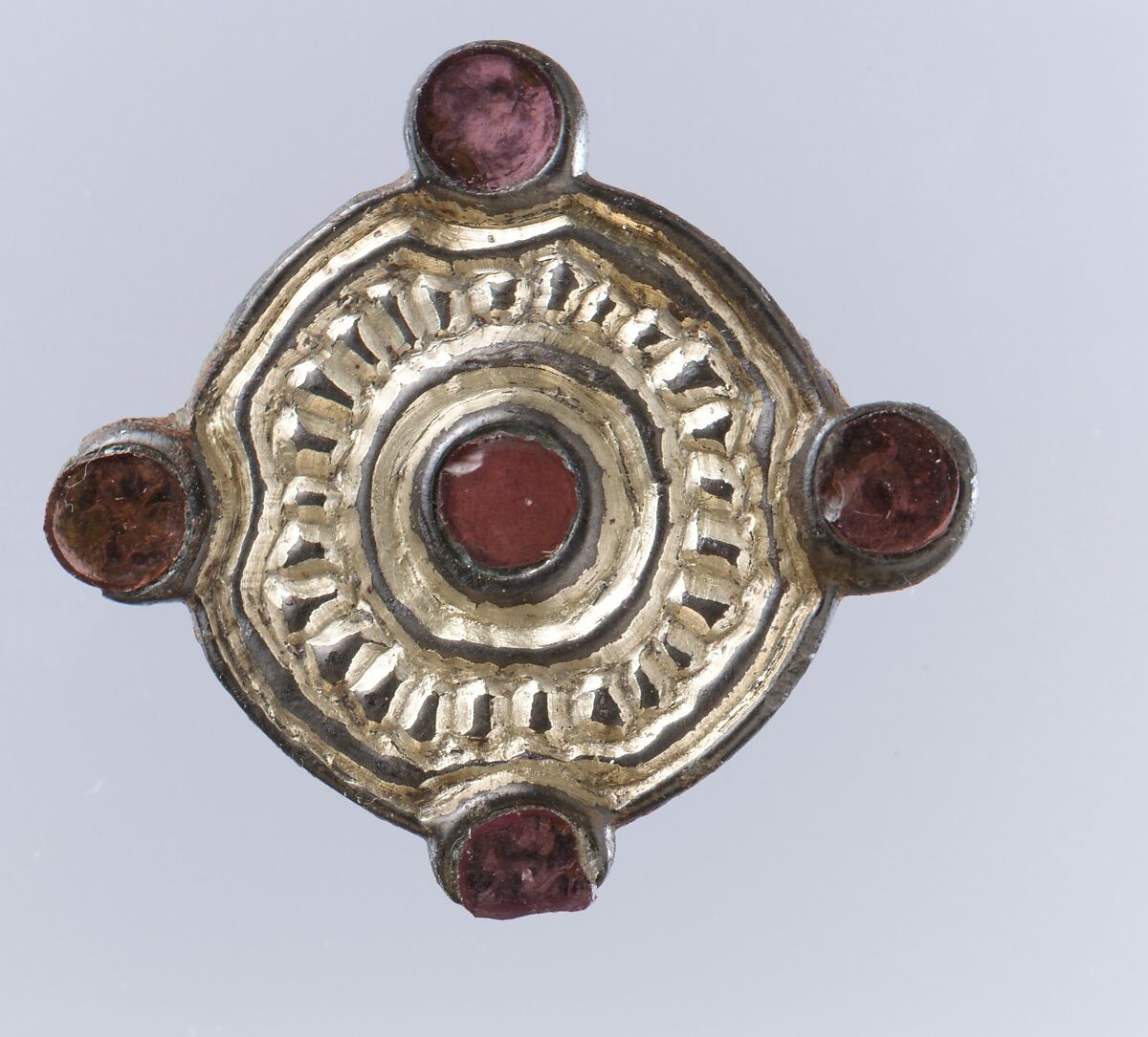 Whorl-Shaped Brooch, Silver-gilt, glass paste, remnant of iron pin, Frankish 