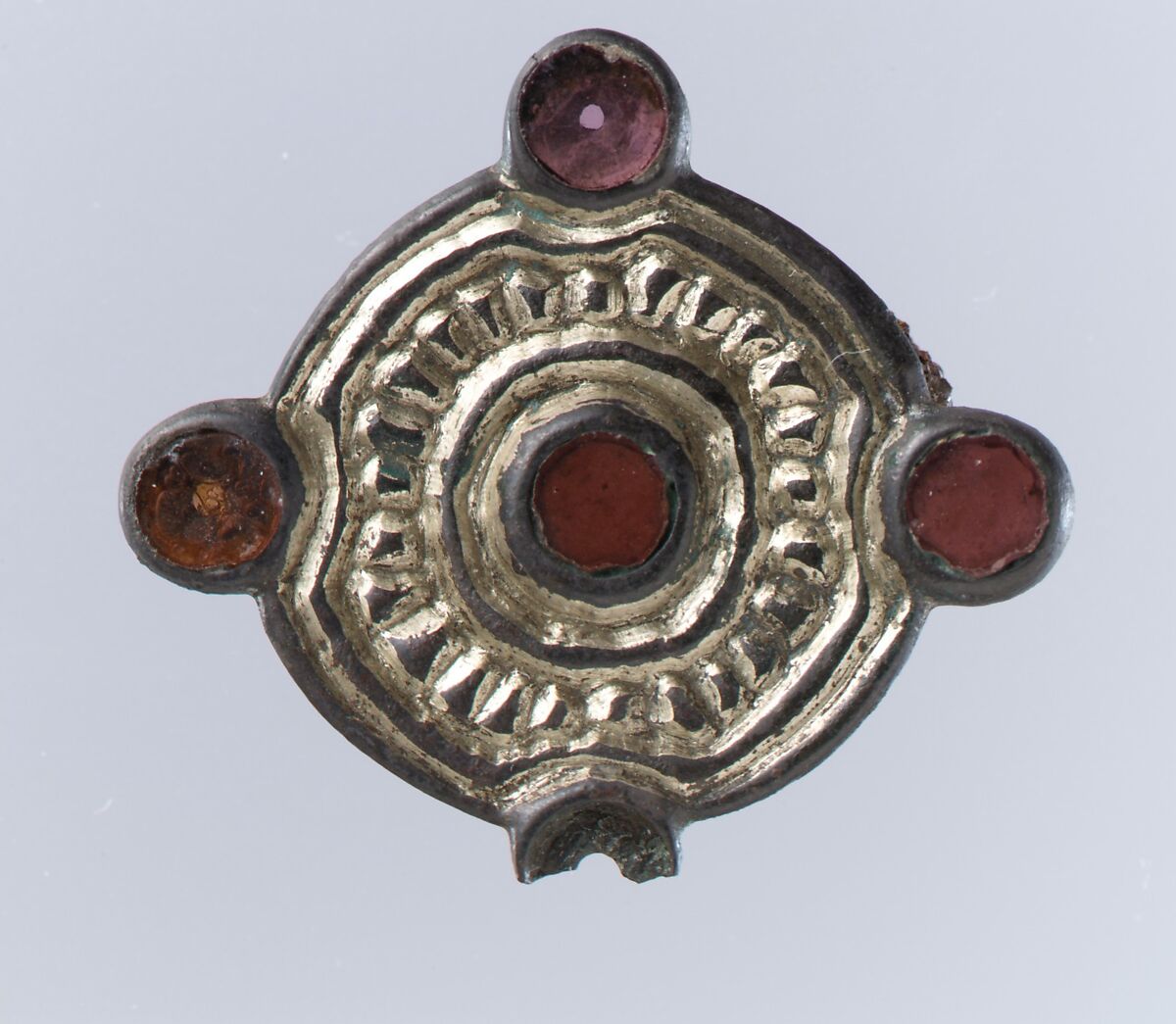 Whorl-Shaped Brooch, Silver-gilt, glass paste, remnant of iron pin, Frankish 