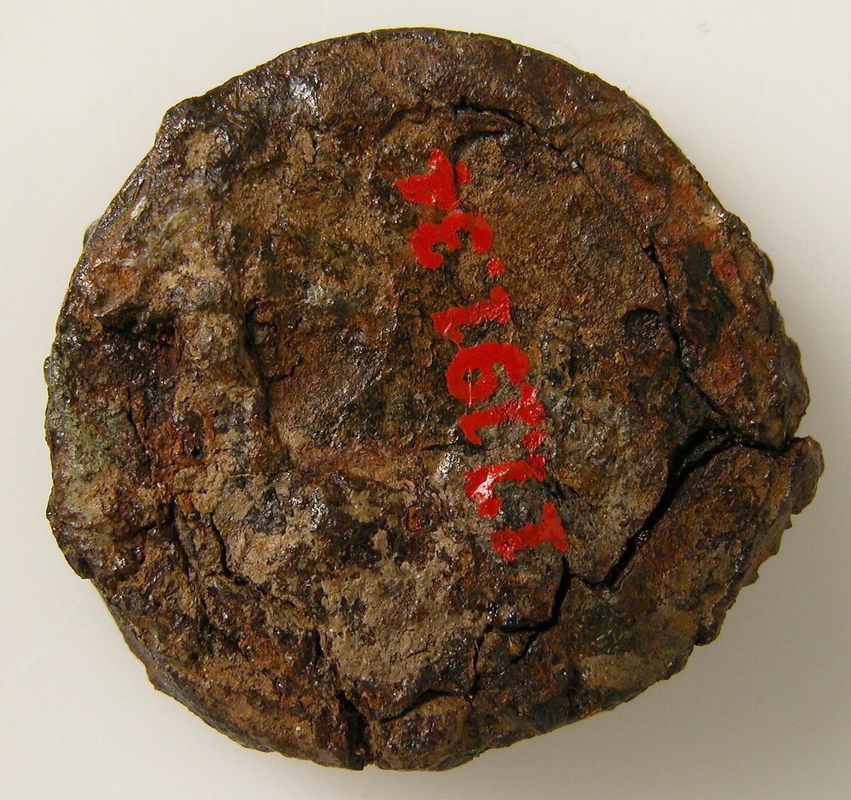 Disk Brooch, Silver-gilt on iron core, garnet, mother of pearl, Frankish