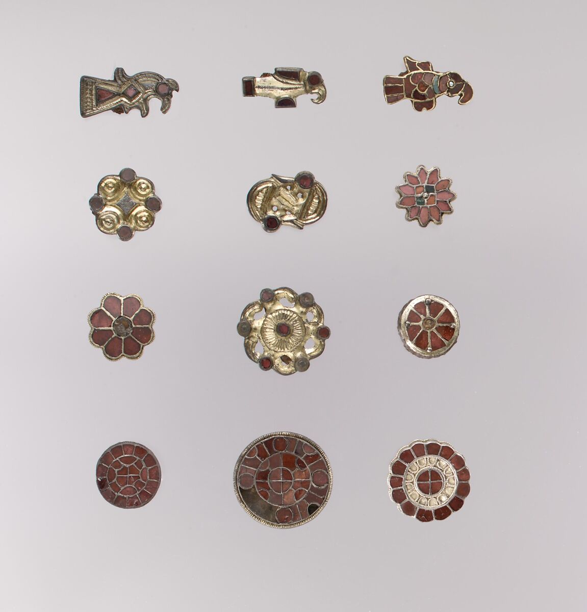 Disk Brooch, Silver-gilt, garnets with patterned foil backings., Frankish