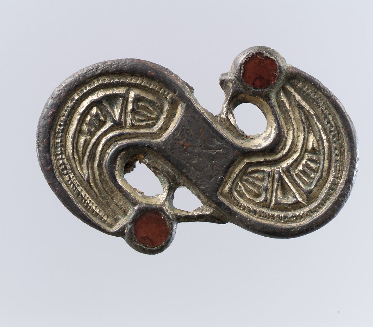 S-Shaped Brooch, Silver-cast relief and settings; chased, punched; garnets, gilt; iron pin., Frankish 