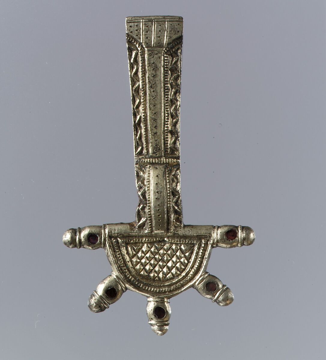 Bow Brooch, Silver-gilt, garnets, Frankish 