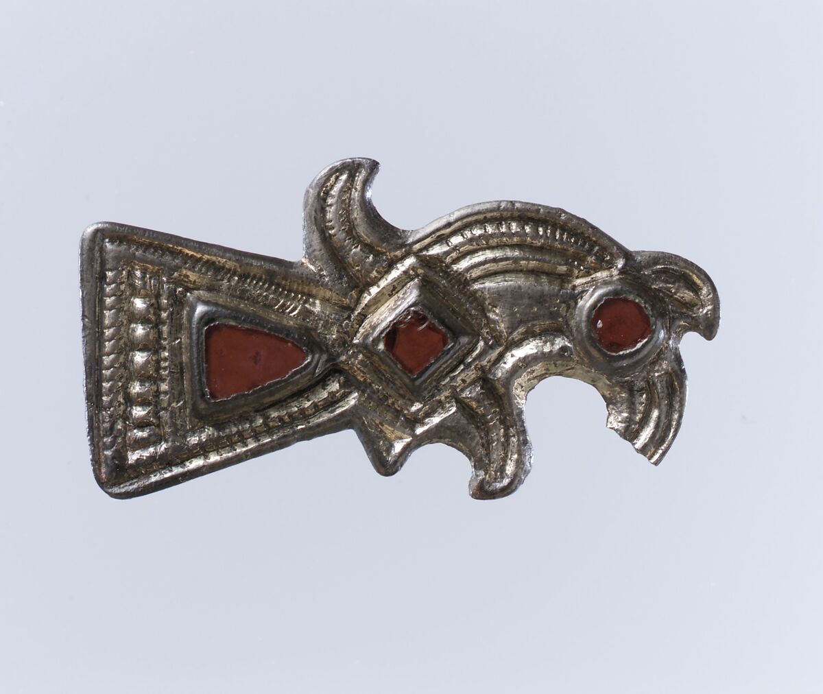 Bird-Shaped Brooch, Silver-gilt, garnets with patterned foil backings; iron spring/pin, Frankish 