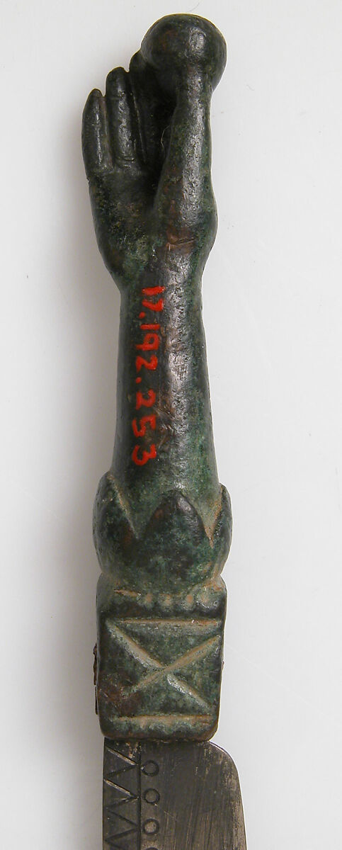 Knife with a Hand Holding an Orb, Copper alloy handle, steel blade, Late Roman
