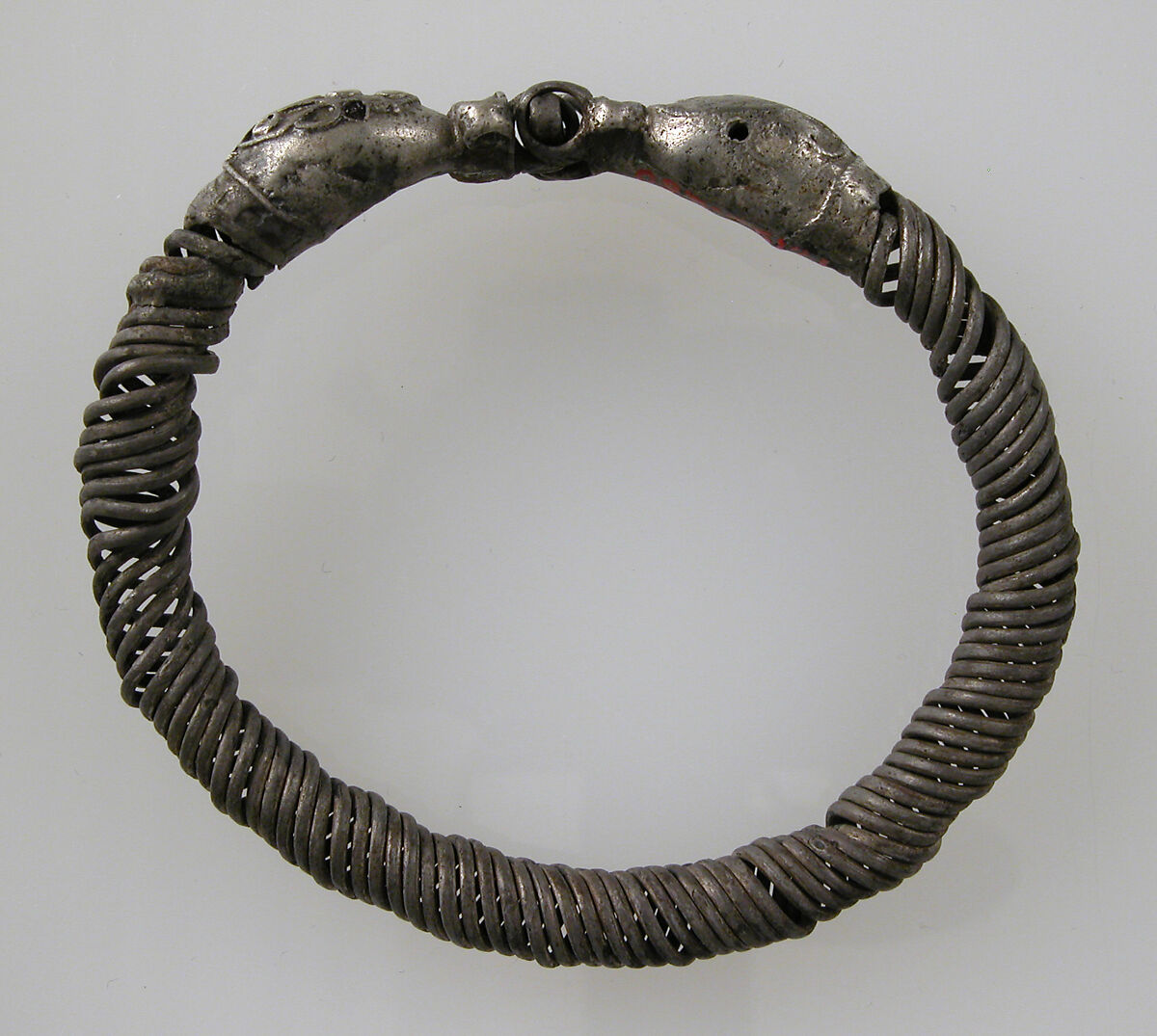 Bracelet, Silver, garnet or glass paste eyes, Roman 