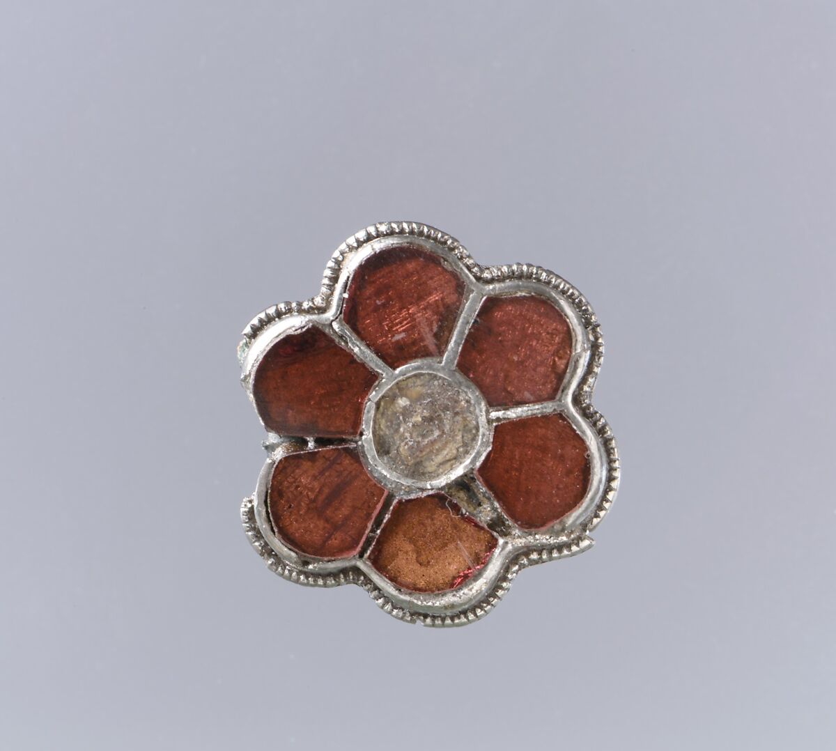 Rosette Brooch, Silver-gilt, beaded filigree edging, garnets with patterned foil ..., Frankish 