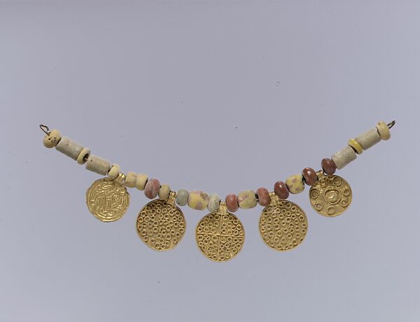 Gold Pendants and Beads from a Necklace