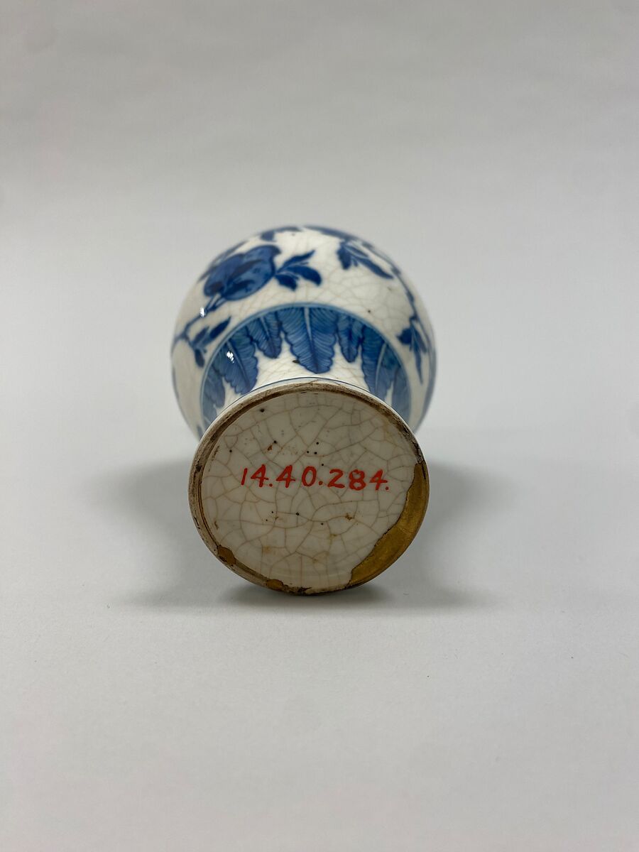 Vase with peaches, pomegranates, and fingered citrons, Soft-paste porcelain painted in underglaze cobalt blue (Jingdezhen ware), silver mount, China