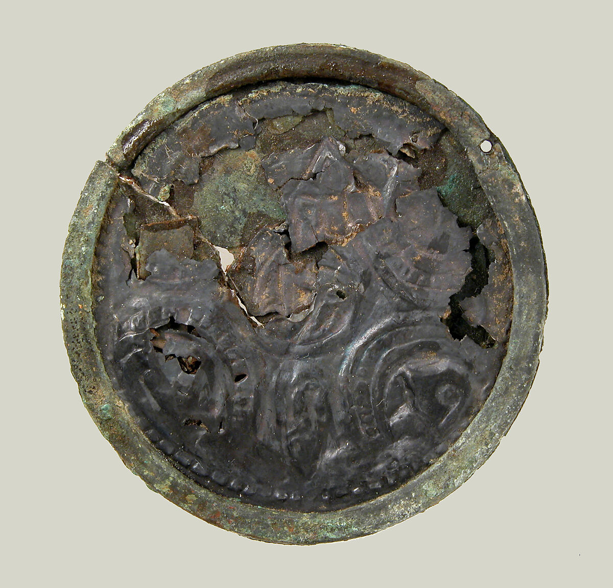 Bracteate, Silver, copper alloy core, remnants of iron pin, Frankish 