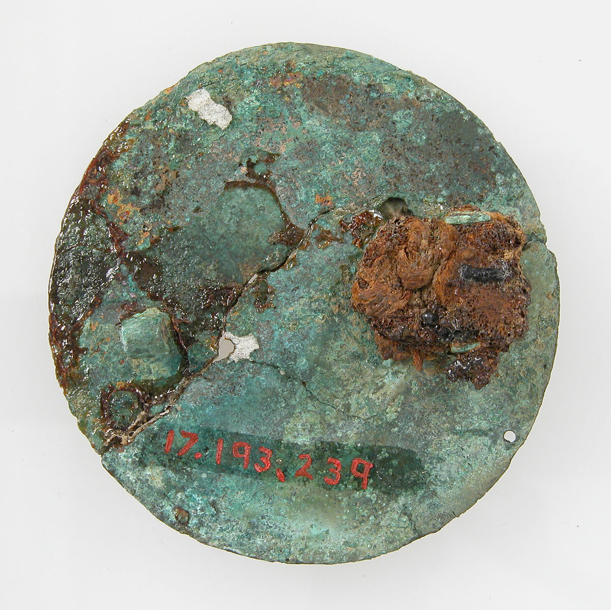 Bracteate, Silver, copper alloy core, remnants of iron pin, Frankish