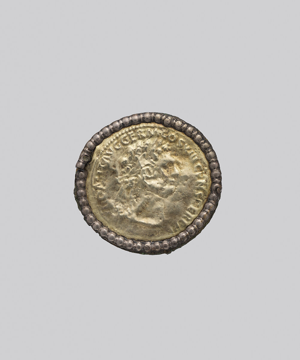 Gold Disk Brooch, Silver-gilt on bronze, with iron pin, Frankish 