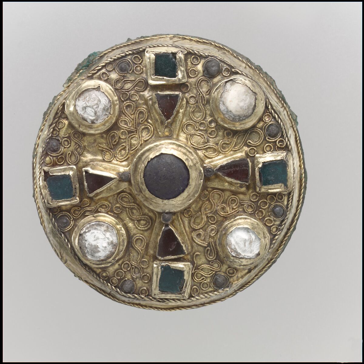 Disk Brooch, Gold sheet with copper alloy backing, and inlays of garnet, glass and calcite, Frankish