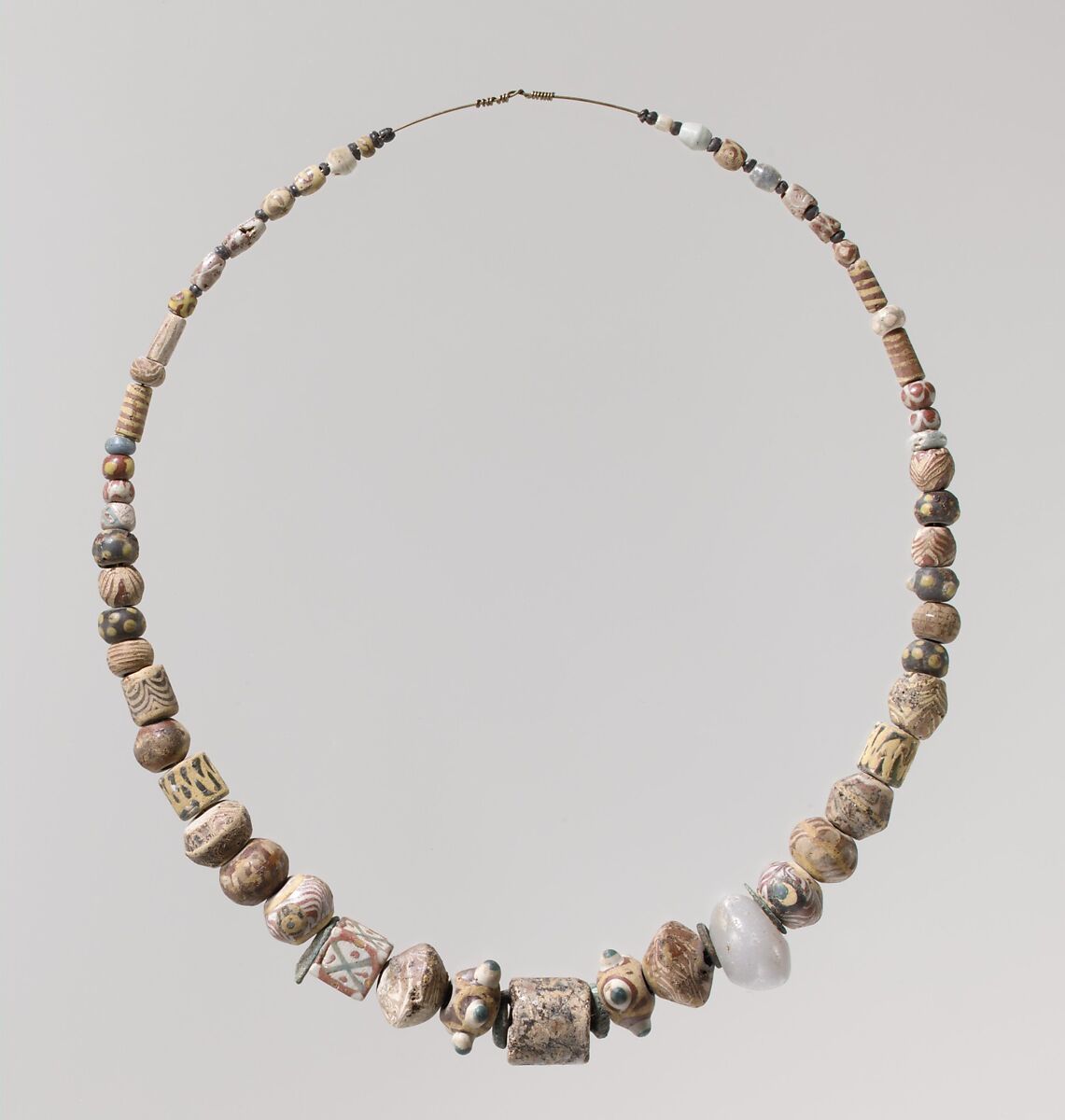 Beads from a Necklace, Glass, copper alloy rings, Frankish 