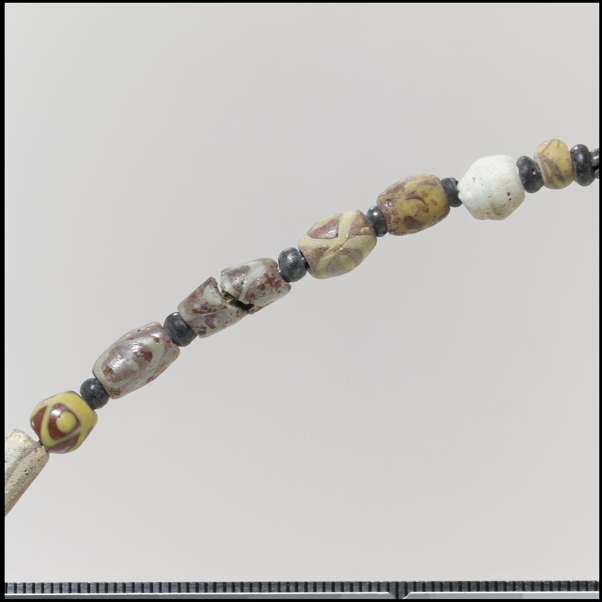 Beads from a Necklace, Glass, copper alloy rings, Frankish