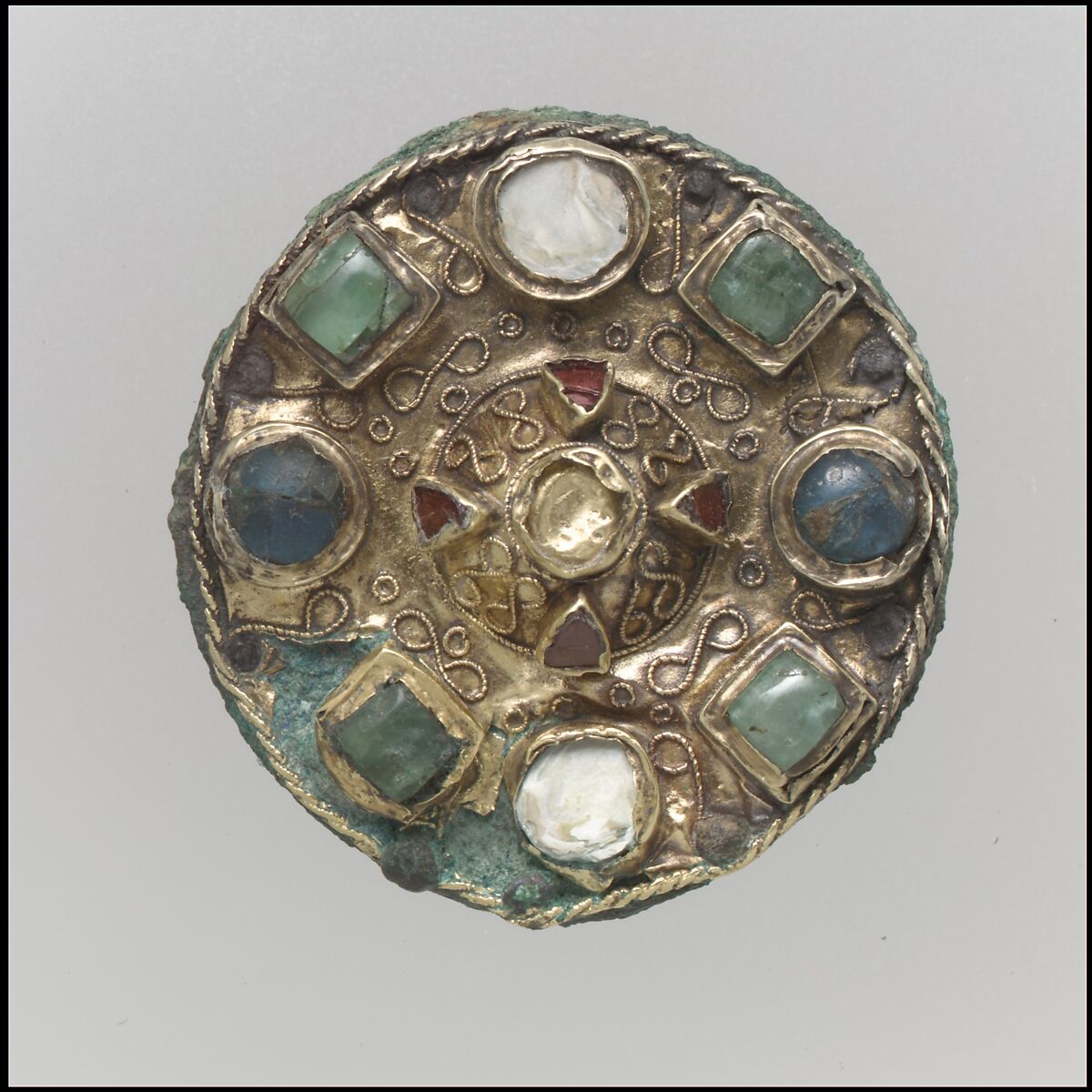 Disk Brooch, Gold, filigree, mother-of-pearl, garnets, blue and green stones, Frankish 