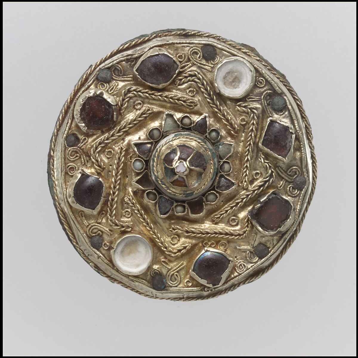 Disk Brooch, Gold; garnet; red, pale, amber and blue glass; mother-of-pearl, Frankish