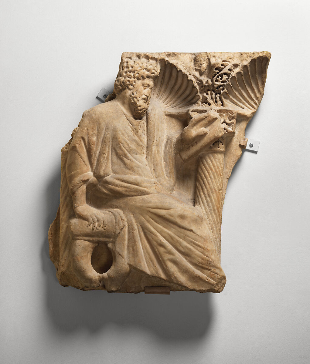 Fragment of a Sarcophagus with a Seated Figure, Marble, Roman 