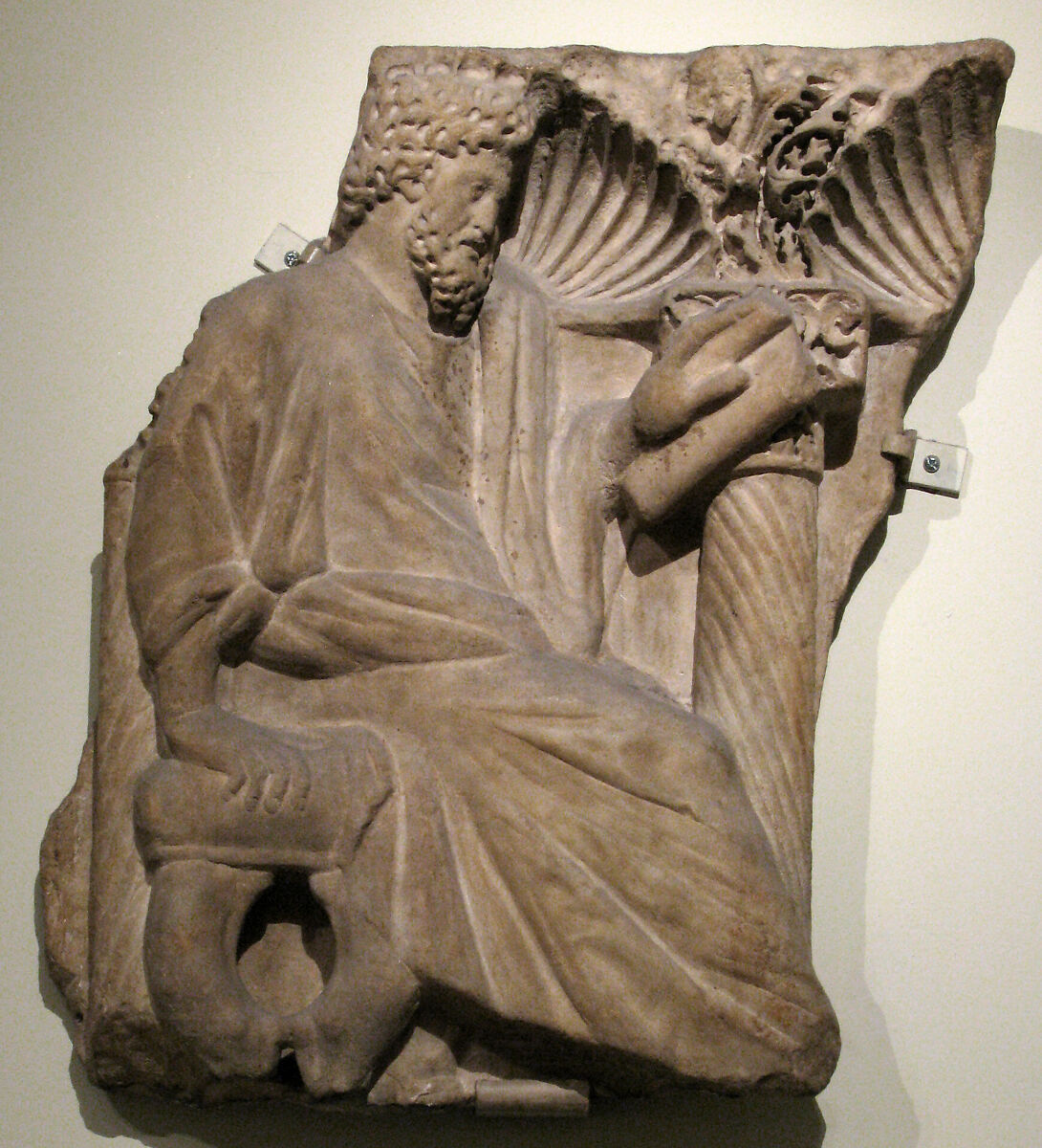 Fragment of a Sarcophagus with a Seated Figure, Marble, Roman