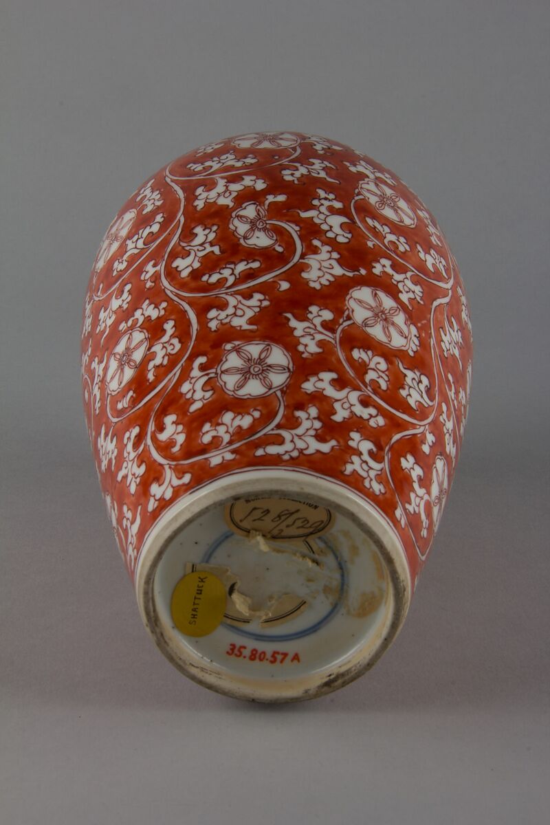 Covered bottle with floral scrolls (one of a pair), Porcelain painted with overglaze red enamel (Jingdezhen ware), China