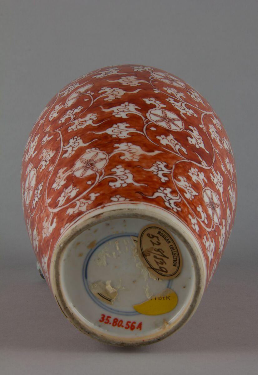Covered bottle with floral scrolls (one of a pair), Porcelain painted with overglaze red enamel (Jingdezhen ware), China