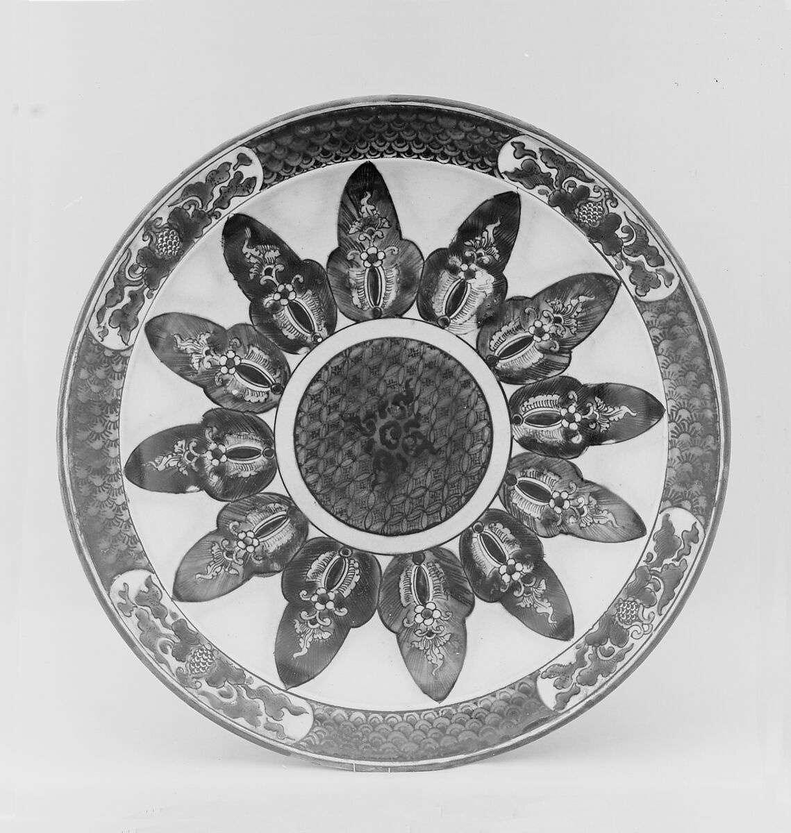 Plate, Pottery covered with glaze and enameled in five colors (Hizen ware, Kutani type), Japan 