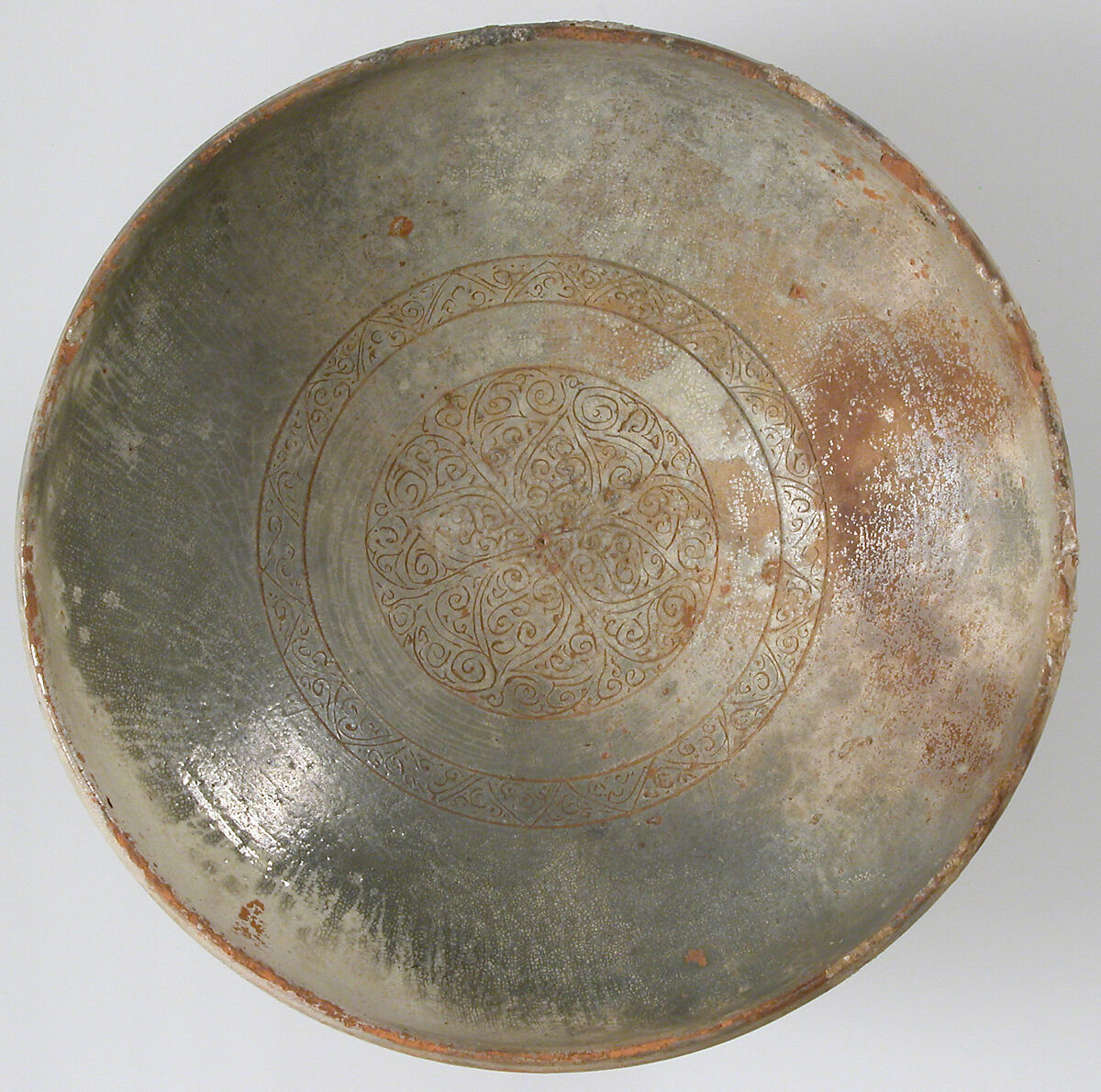 Bowl with Ornamented Rosette, Fired red earthenware, greenish/gray cream slip, clear glaze, Byzantine 