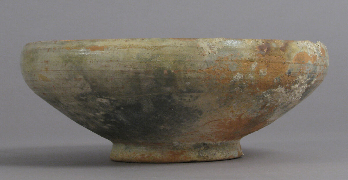 Bowl with Ornamented Rosette, Fired red earthenware, greenish/gray cream slip, clear glaze, Byzantine