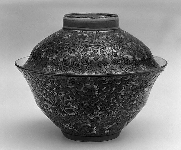 Covered bowl with floral patterns