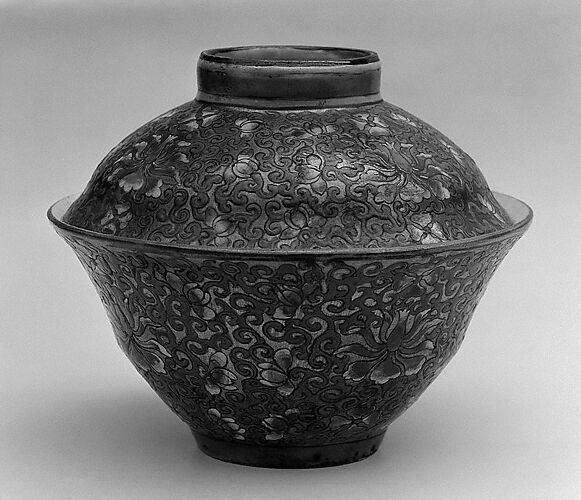 Covered bowl with floral patterns