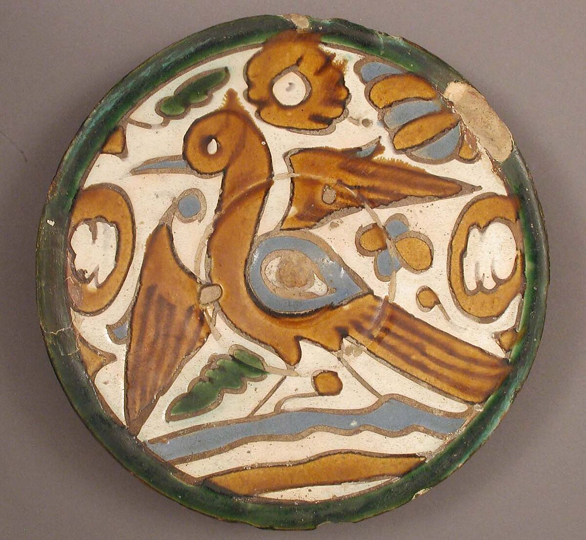 Plate with Water Bird, Tin-glazed earthenware (cuerda seca technique), Spanish 