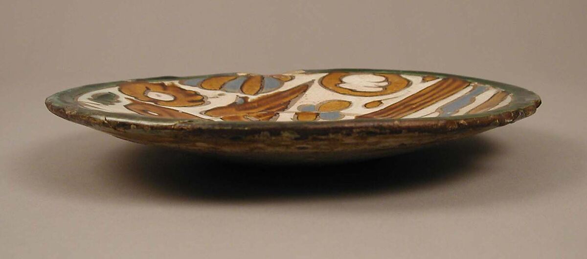Plate with Water Bird, Tin-glazed earthenware (cuerda seca technique), Spanish