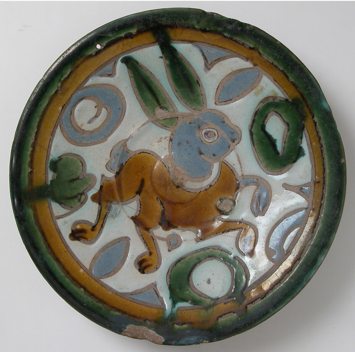 Plate, Tin-glazed earthenware (cuerda seca technique), Spanish 