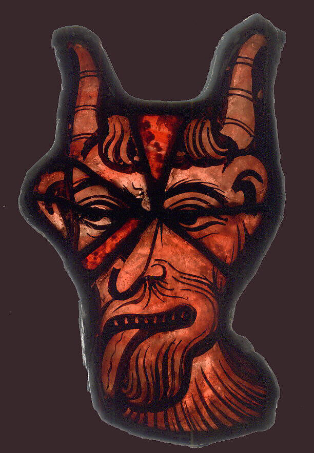Glass Fragment of a Devil, Pot-metal glass, vitreous paint, and lead, French