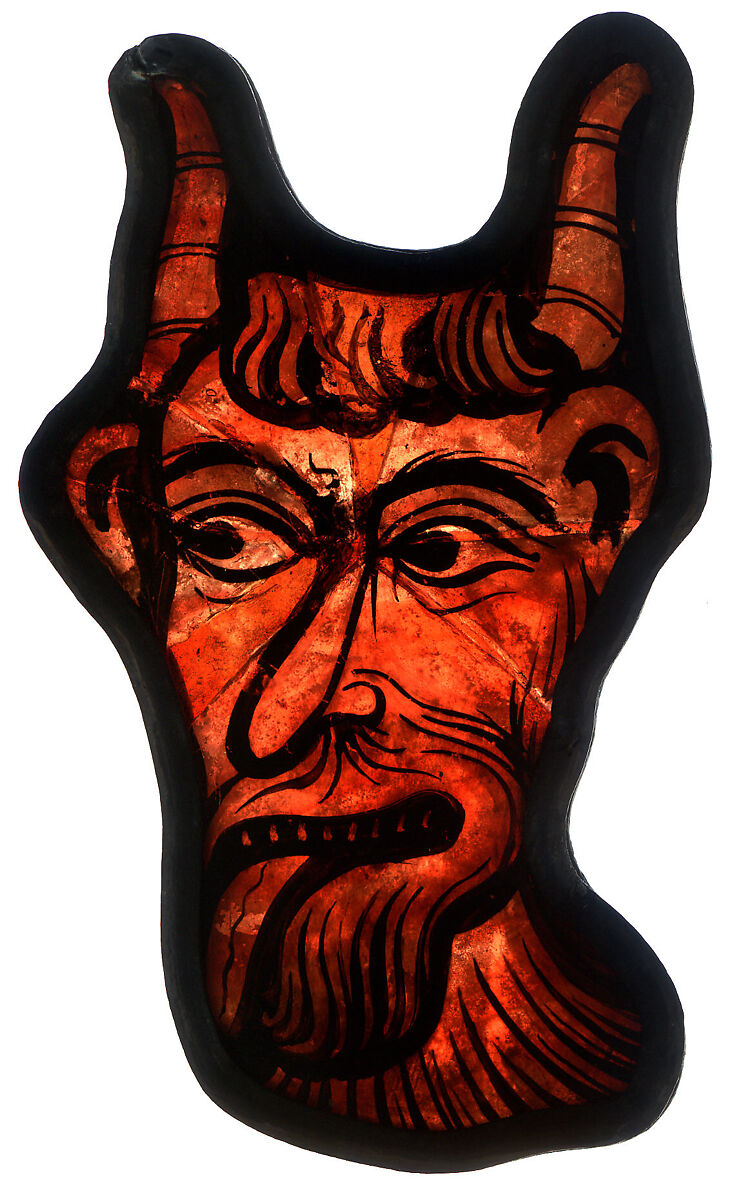 Glass Fragment of a Devil, Pot-metal glass, vitreous paint, and lead, French