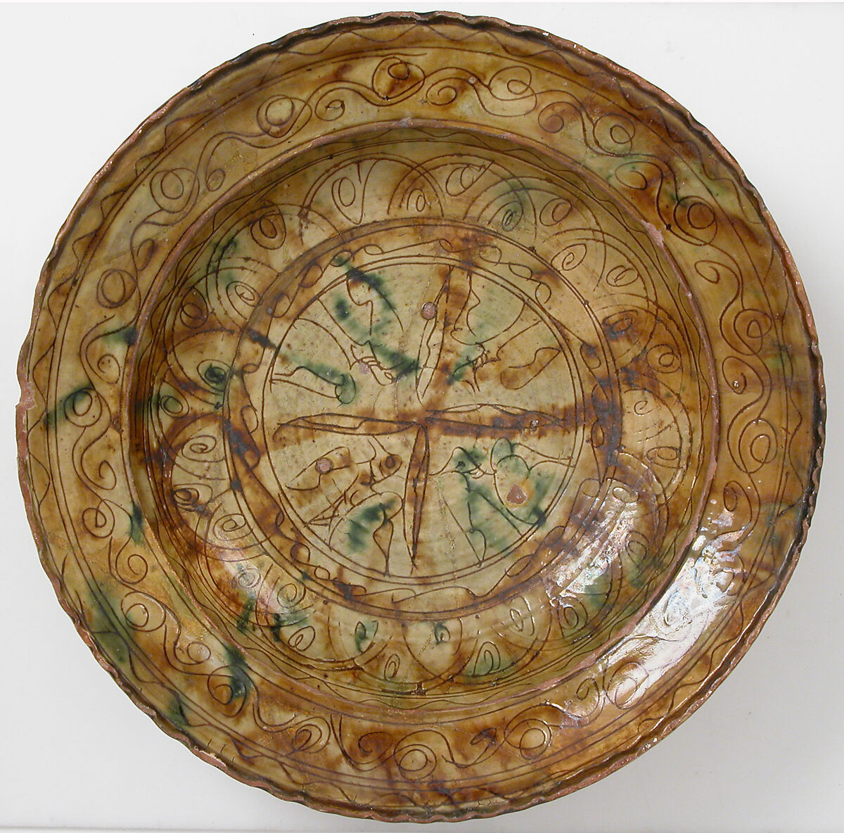 Tricolor Bowl, Terracotta with yellow-brown and green glaze over slip, decorated in sgraffito, Byzantine