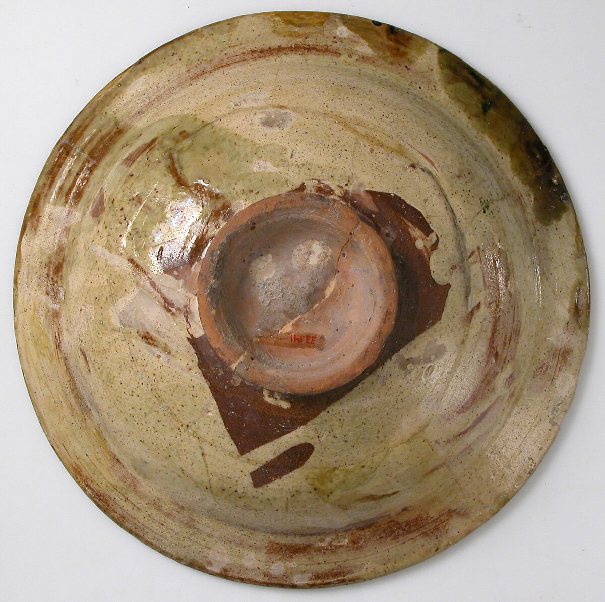 Tricolor Bowl, Terracotta with yellow-brown and green glaze over slip, decorated in sgraffito, Byzantine