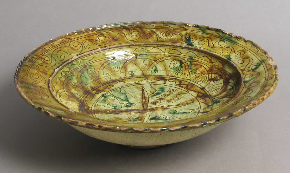 Tricolor Bowl, Terracotta with yellow-brown and green glaze over slip, decorated in sgraffito, Byzantine 