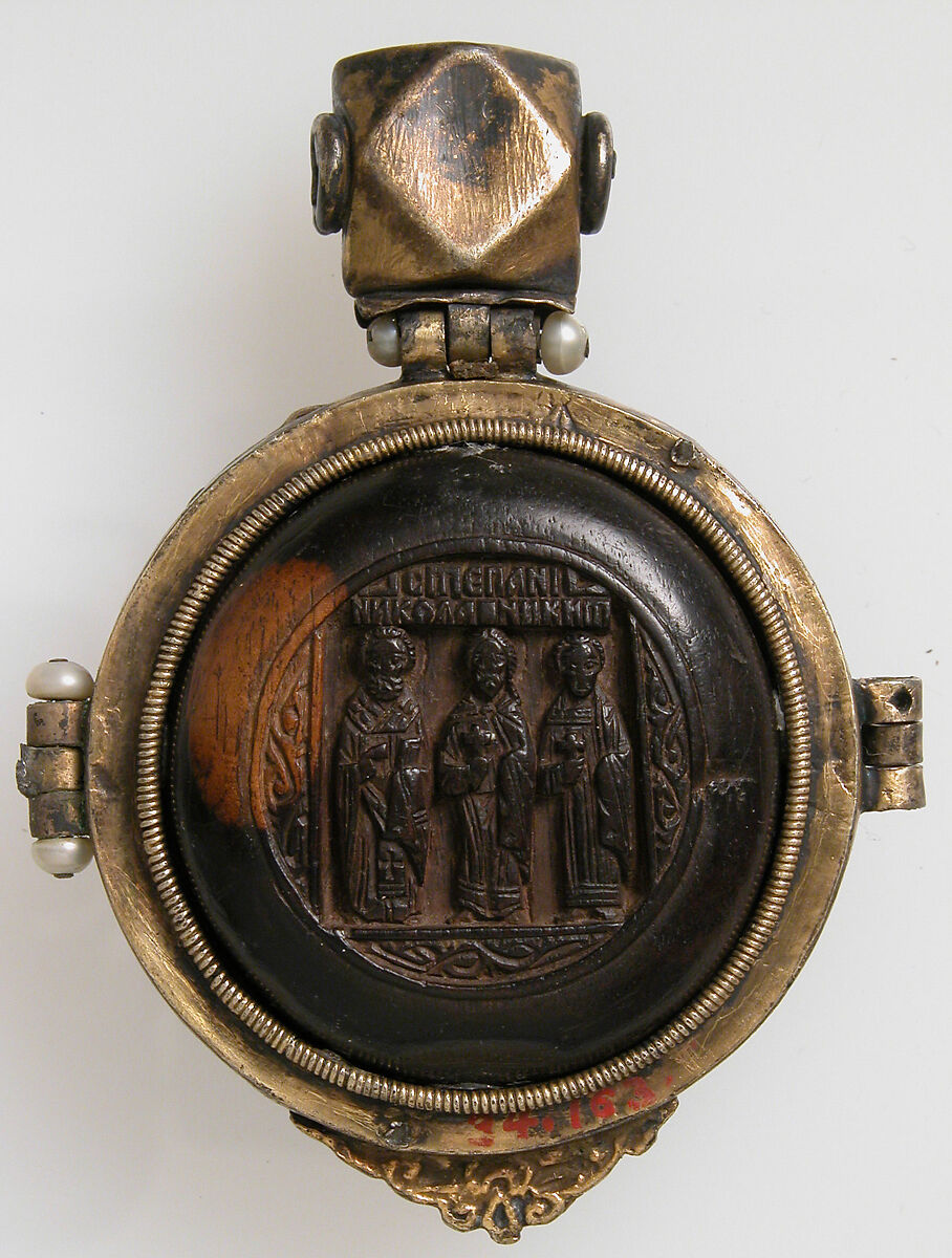 Panagiarion with the Virgin and Child and the Three Angels at Mamre (interior) and the Crucifixion and Three Church Fathers (exterior), Wood, stained, silver-gilt, pearls and garnet, Russian