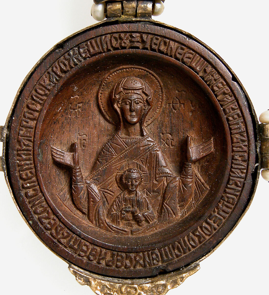 Panagiarion with the Virgin and Child and the Three Angels at Mamre (interior) and the Crucifixion and Three Church Fathers (exterior), Wood, stained, silver-gilt, pearls and garnet, Russian