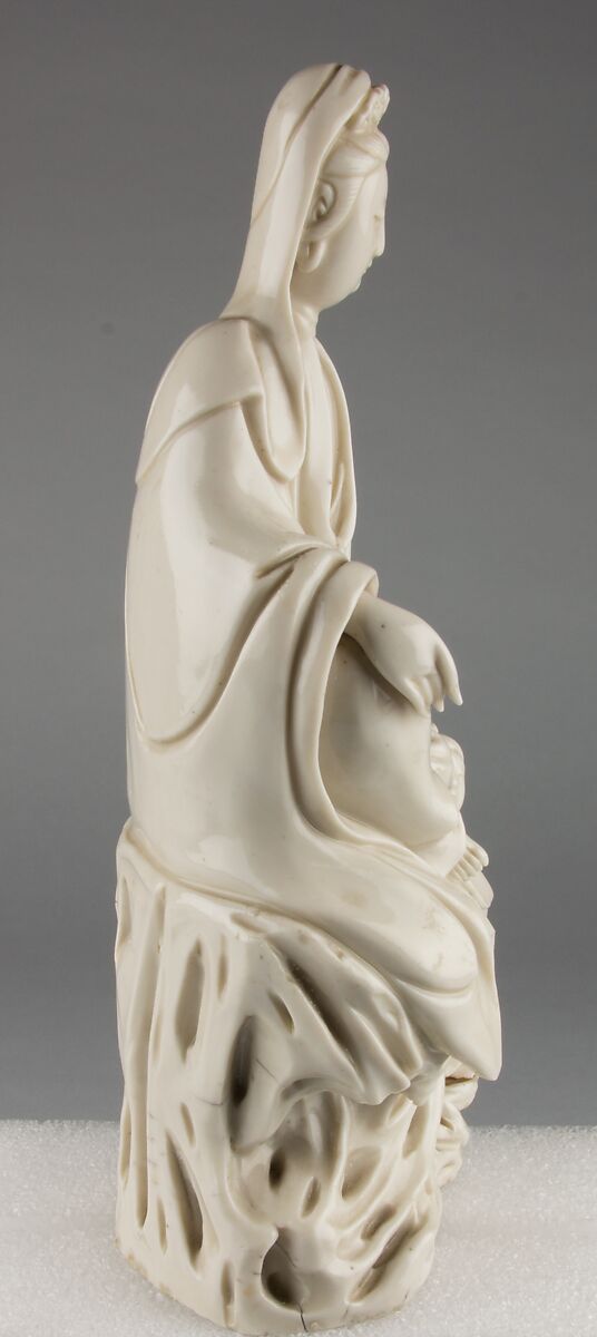 Seated bodhisattva Guanyin with an attendant, Porcelain with ivory glaze (Dehua ware), China