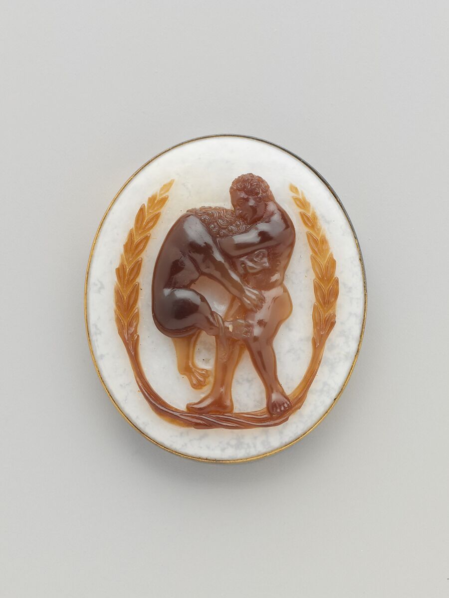 Cameo with Hercules and the Nemean Lion within a Garland, Sardonyx with modern gold frame, South Italian 