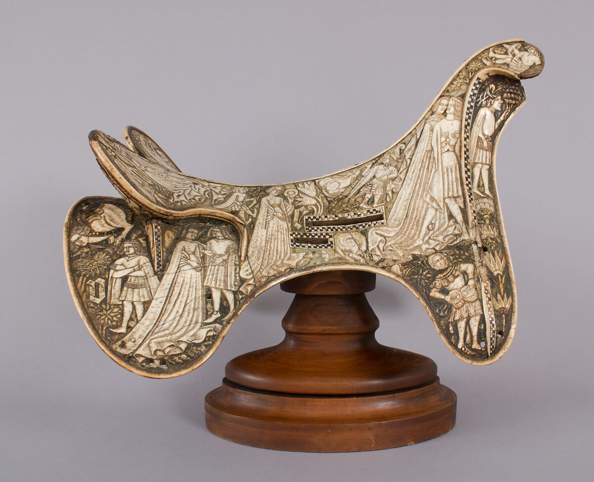 Saddle, Bovine bone (body of saddle), deer antler and bone (decorative elements), limewood, rawhide, birchbark, and metal paint, Central European