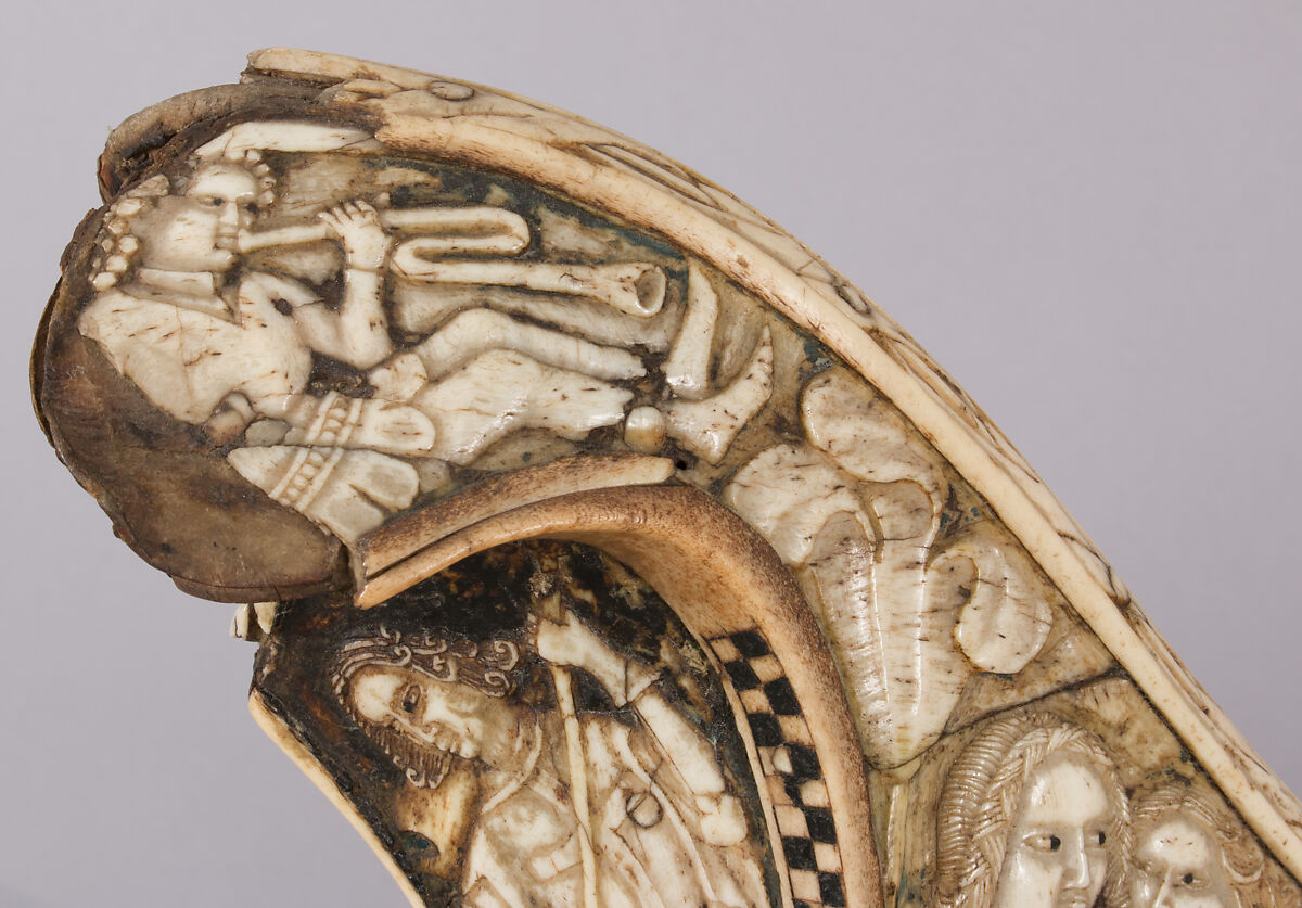 Saddle, Bovine bone (body of saddle), deer antler and bone (decorative elements), limewood, rawhide, birchbark, and metal paint, Central European