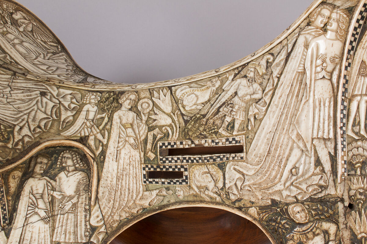 Saddle, Bovine bone (body of saddle), deer antler and bone (decorative elements), limewood, rawhide, birchbark, and metal paint, Central European