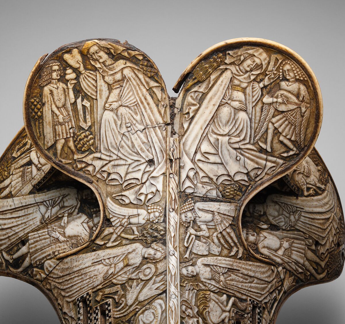 Saddle, Bovine bone (body of saddle), deer antler and bone (decorative elements), limewood, rawhide, birchbark, and metal paint, Central European