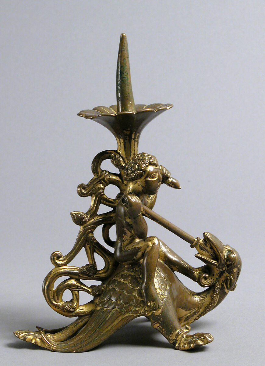 Pricket Candlestick with a Naked Youth Fighting a Dragon, Gilded copper alloy, South Netherlandish