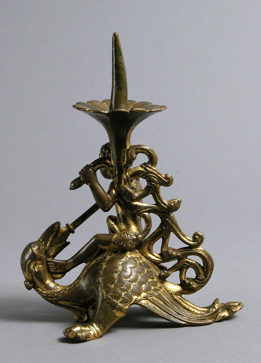 Pricket Candlestick with a Naked Youth Fighting a Dragon, Gilded copper alloy, South Netherlandish