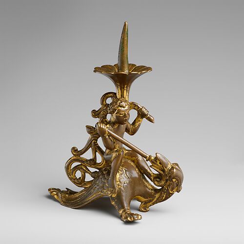 Pricket Candlestick with a Naked Youth Fighting a Dragon