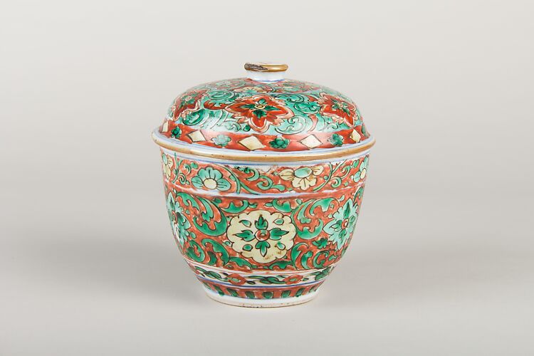 Covered jar with floral patterns (one of a pair)